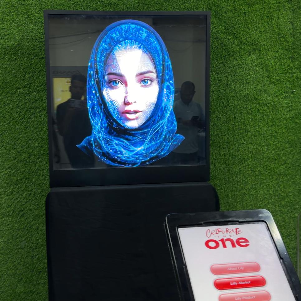 AI kiosk at an event features a digital display of a ai hologram woman in a blue hijab